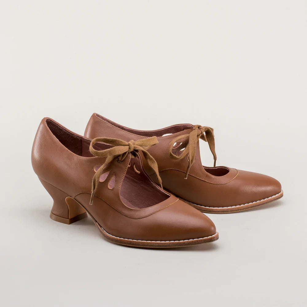 Hollow-out high-heeled lace-up large-size women's casual shoes